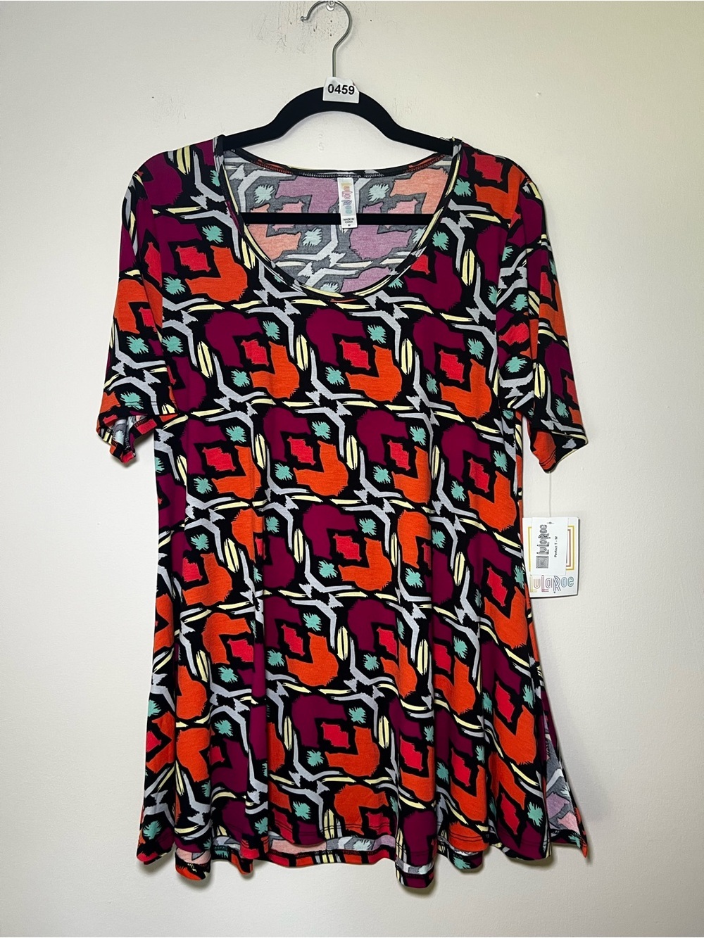 LuLaRoe Perfect T Short Sleeve Swing Top in Magenta and Orange Geo Print